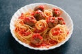 Rustic italian american meatball spaghetti tomato sauce Royalty Free Stock Photo