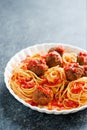 Rustic italian american meatball spaghetti tomato sauce Royalty Free Stock Photo