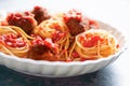 Rustic italian american meatball spaghetti tomato sauce Royalty Free Stock Photo