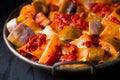 Rustic italian baked cheese rigatoni pasta with eggplant and tomato