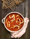 Rustic italian calamari seafood soup Royalty Free Stock Photo
