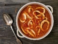Rustic italian calamari seafood soup Royalty Free Stock Photo
