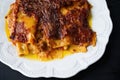 Rustic italian crispy crust bolognese lasagna comfort food