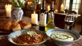 Rustic Italian Dinner Table Setting with Pasta, Fresh Ingredients, Wine Bottles, Bread Rolls, and Romantic Candlelight Ambiance Royalty Free Stock Photo