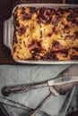 Rustic Italian Lasagna Bolognese on Dark Wooden Background Royalty Free Stock Photo