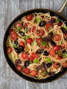Rustic italian spaghetti puttanesca pasta Royalty Free Stock Photo