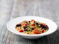 Rustic italian spaghetti puttanesca pasta Royalty Free Stock Photo