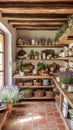 A rustic kitchen with open shelving terracotta flooring and lavender decor. Royalty Free Stock Photo