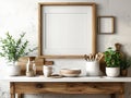 Rustic kitchen still life with a blank frame, plants, and dishes on a wooden table