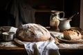 Rustic kitchenware and a dusting of flour and homemade bread in a cozy composition