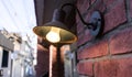 Rustic lamp on bricks Royalty Free Stock Photo