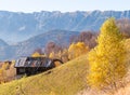 Rustic landscape with an abandoned old wooden house or shelter in the Carpathain Mountains, Romania. Autumn landscape Royalty Free Stock Photo