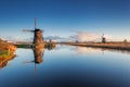 Rustic landscape with beautiful traditional dutch windmills Royalty Free Stock Photo