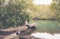 Rustic large hewn timber jetty in Australian bushland