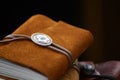 Rustic Leather Journal with Turquoise Concho, Shallow Focus Royalty Free Stock Photo