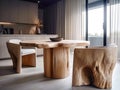 Rustic live edge dining table and solid wood armchairs close up. Organic interior design of modern living room in farmhouse.