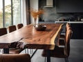 Rustic live edge dining table and solid wood chairs close up. Organic interior design of modern living room in farmhouse