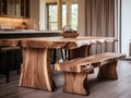 Rustic live edge dining table and solid wood stools close up. Organic interior design of modern living room in farmhouse