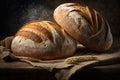 A rustic crusty loaf of bread on a wooden table.