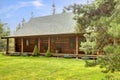 Rustic log cabin front porch exterior. Royalty Free Stock Photo