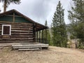 Rustic log cabin from 1920s dude ranch in national park Royalty Free Stock Photo