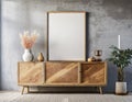 In this rustic modern living room, a firefly wooden cabinet or dresser stands against a textured concrete wall. Royalty Free Stock Photo