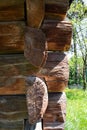 Rustic mood. Construction from a wooden log house. Wooden wall. Rustic style. Ecological housing. Royalty Free Stock Photo