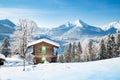 Rustic mountain cabin in the Alps in winter