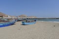 Rustic multi colored fishing boats in Cerro Azul, Lima