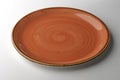 Rustic ocher plate isolated on white background Royalty Free Stock Photo