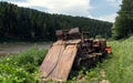 Rustic old abandoned bulldozer in the forest