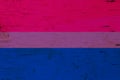 A rustic old bisexual flag on weathered wood Royalty Free Stock Photo