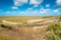 Rustic old boat left to decay on Salt Marshes between Blakeney and Cley