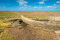 Rustic old boat left to decay on Salt Marshes between Blakeney and Cley