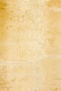 Rustic old European classical style gold stucco wall patina background texture Royalty Free Stock Photo