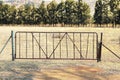 Rustic Old Farm Gate to Open Grass Field Royalty Free Stock Photo