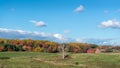 Rustic Old Red Barn in a Grassy Meadow on a Maryland Farm during Autumn with Vivid Fall Colors Royalty Free Stock Photo