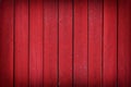 Rustic old red wood plank background with vignette