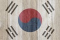 A rustic old South Korean flag on weathered wood Royalty Free Stock Photo