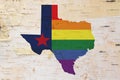 A rustic old Texas pride flag with state map on weathered wood Royalty Free Stock Photo