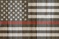A rustic old thin red line flag on weathered wood Royalty Free Stock Photo