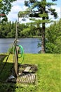 Rustic old log cabin outdoor shower located in Childwold, New York, United States