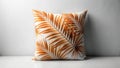 Rustic orange palm leaf pattern decorative throw pillow on a simple white surface. Generative AI Royalty Free Stock Photo
