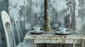 Rustic outdoor cafe table setting, weathered wall backdrop Royalty Free Stock Photo