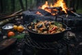 rustic outdoor setting with seafood pasta cooking on campfire