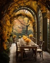 Rustic outdoor table setting with candles, vase of flowers and yellow leaves for a warm and inviting feel