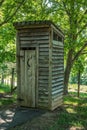 Rustic outhouse in the rural countryside Royalty Free Stock Photo