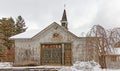 textured old country barn in Winter snow