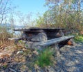 A rustic picnic bench in the yukon territories Royalty Free Stock Photo