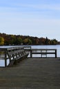 Weathered dock in a lake on a fall day